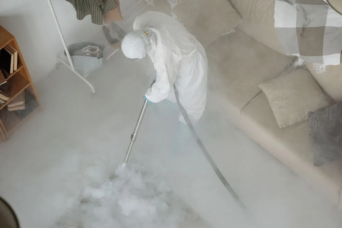 Biohazard cleanup technician in protective equipment, Winchester, KY